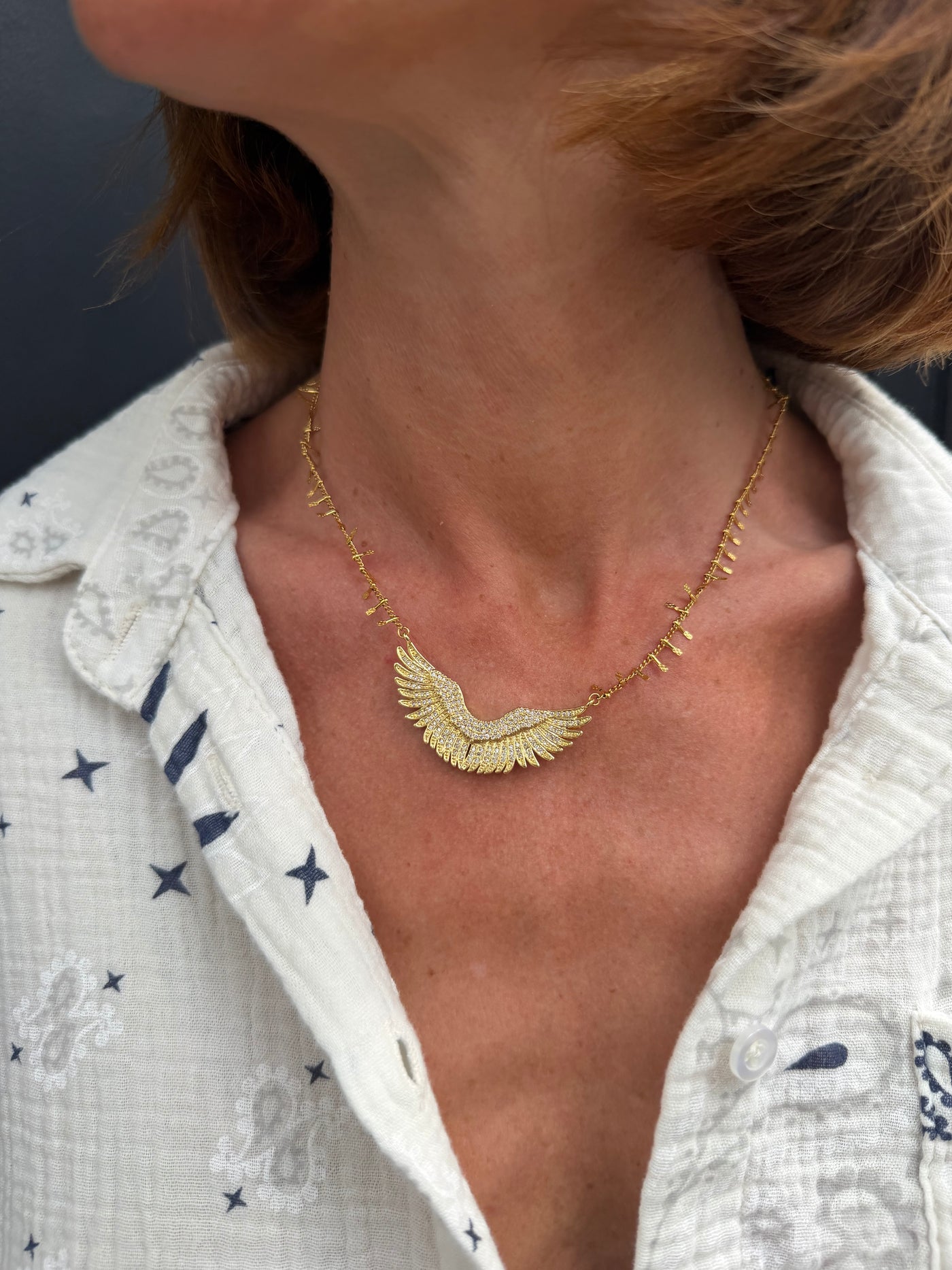 Collier Aigle or et strass